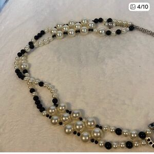 CHANEL Black and White Multi-Strand Pearl Belt with Logo Accent